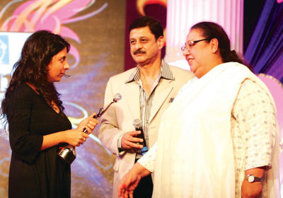 Honey Irani and Anil Mahajan- CEO, Corporate Affairs honouring Zoya Akhtar 