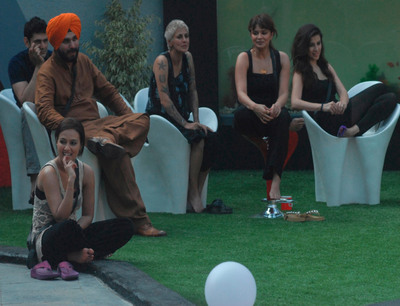 All the housemates sitting and enjoying the task given by Bigg Boss