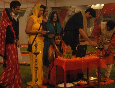 All the housemates doing Lakshmi Puja together