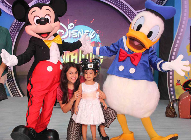 Gurdeep Kohli with daughter and Mickey Mouse & Donal Duck 