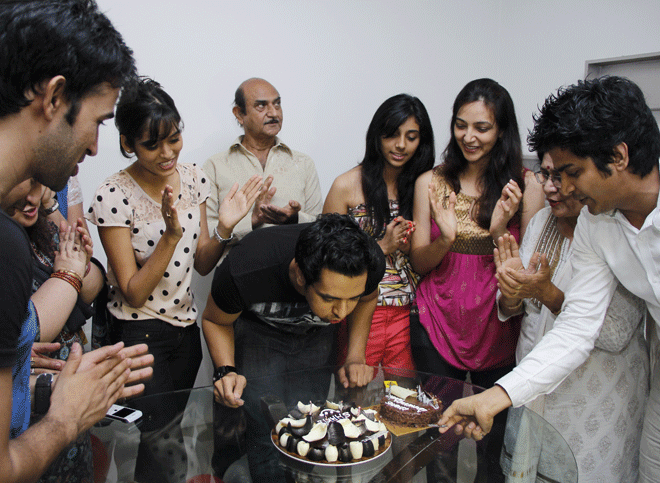Shakti cutting the cake