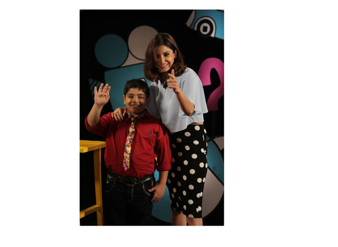 Anushka Sharma poses with host Sadhil kapoor