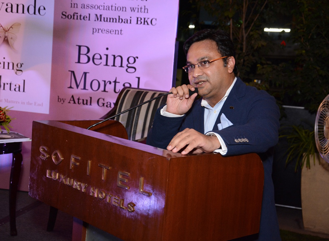 Mr. Biswajit Chakraborty welcomes the audience at the Being Mortal launch