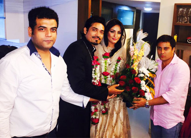 Mr. Waahiid Ali Khan (CMD-Sshaawn Group of Companies) and Designer Asif with the couple
