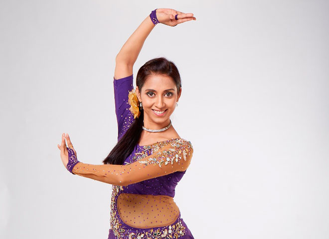 Sneha Adapawar - She loves to perform on Jive, Salsa, Waltz, Tango, & Bollywood.   