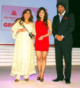 Yuvika Chowdhary and Kulwant Singh (MD, Lama Tours) to Sarah Hashwani 