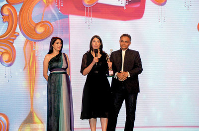 Saher Shaikh (Founder and Director- Adopt a Camp) and Sanjay Verma (Indian Counsul General) to Maria Conceicao 