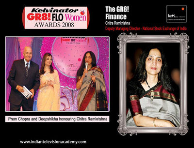 Prem Chopra and Deepshikha honouring Chitra Ramkrishna 